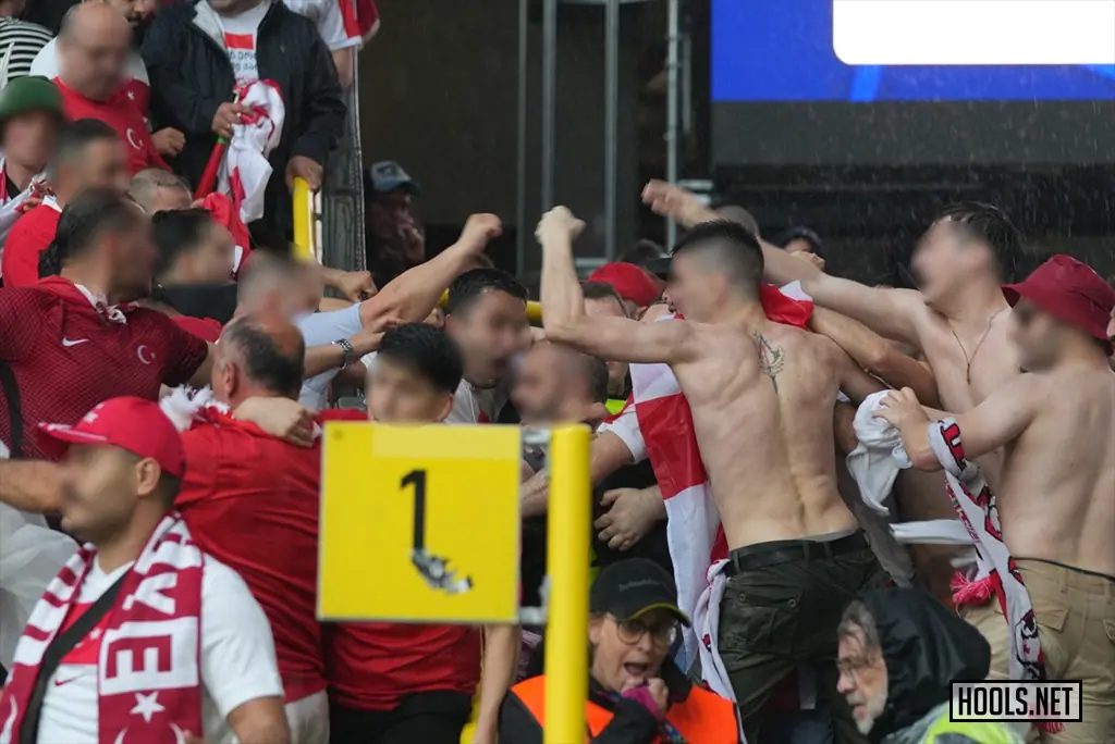 Turkey and Georgia fans fight inside Dortmund's Westfalen stadium before kick-off