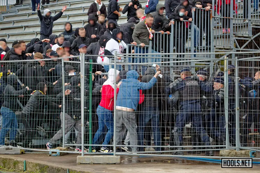 Nancy fans fight police before their French third division match against Boulogne.