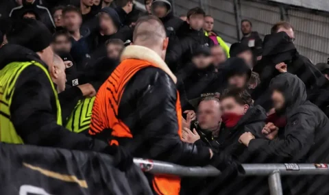 AZ Alkmaar fans fight stewards during Europa League tie at Ferencvaros