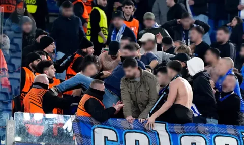 Porto fans scuffle with stewards during Europa League tie at Roma